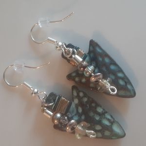 Handcrafted patina style, silver with silver and earth tone beads .